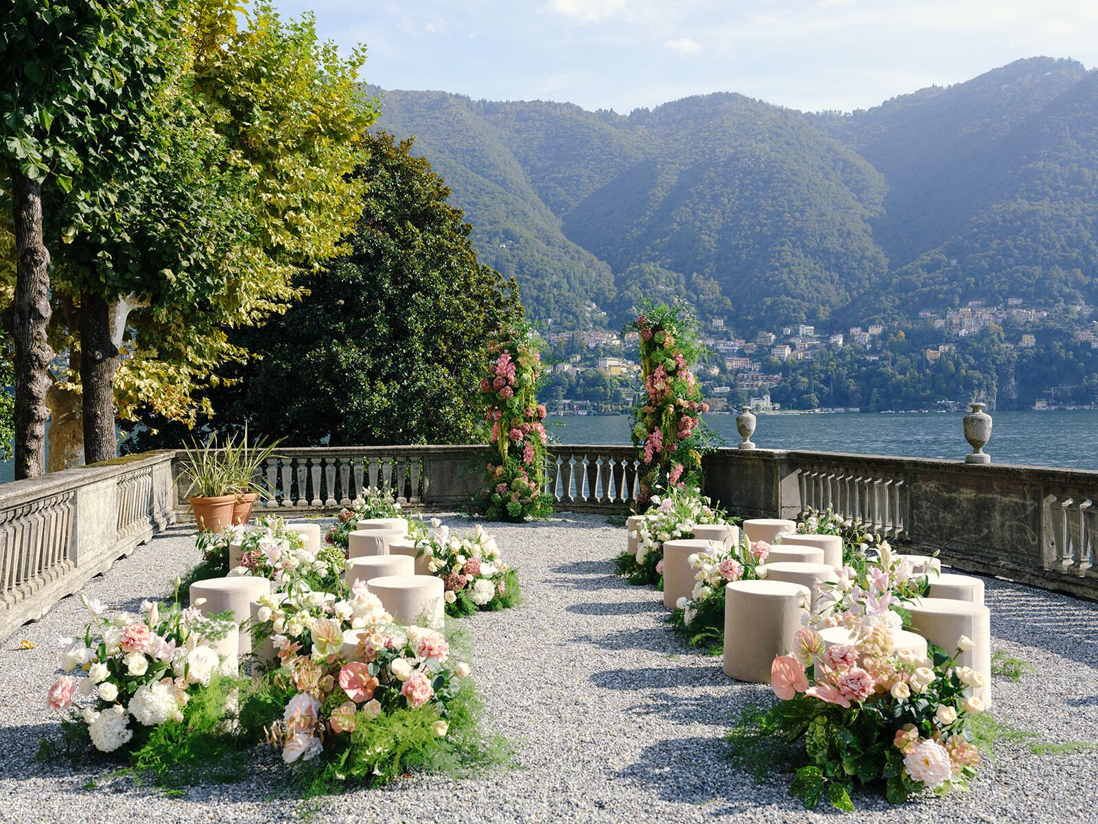 Ceremony set-up with flowers on the lake terrace at Villa Pizzo